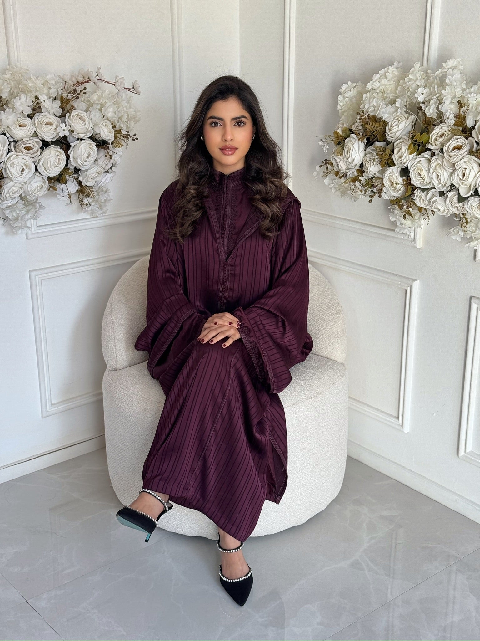 Women wears maroon jellaba two piece for eid and ramadan