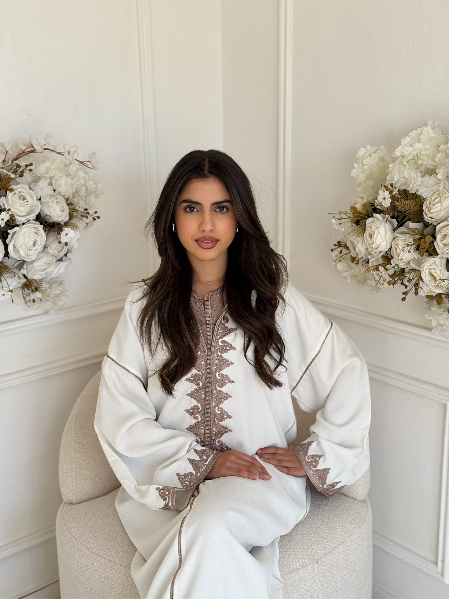 Elegant Moroccan jellaba for women with a soft flowing silhouette.