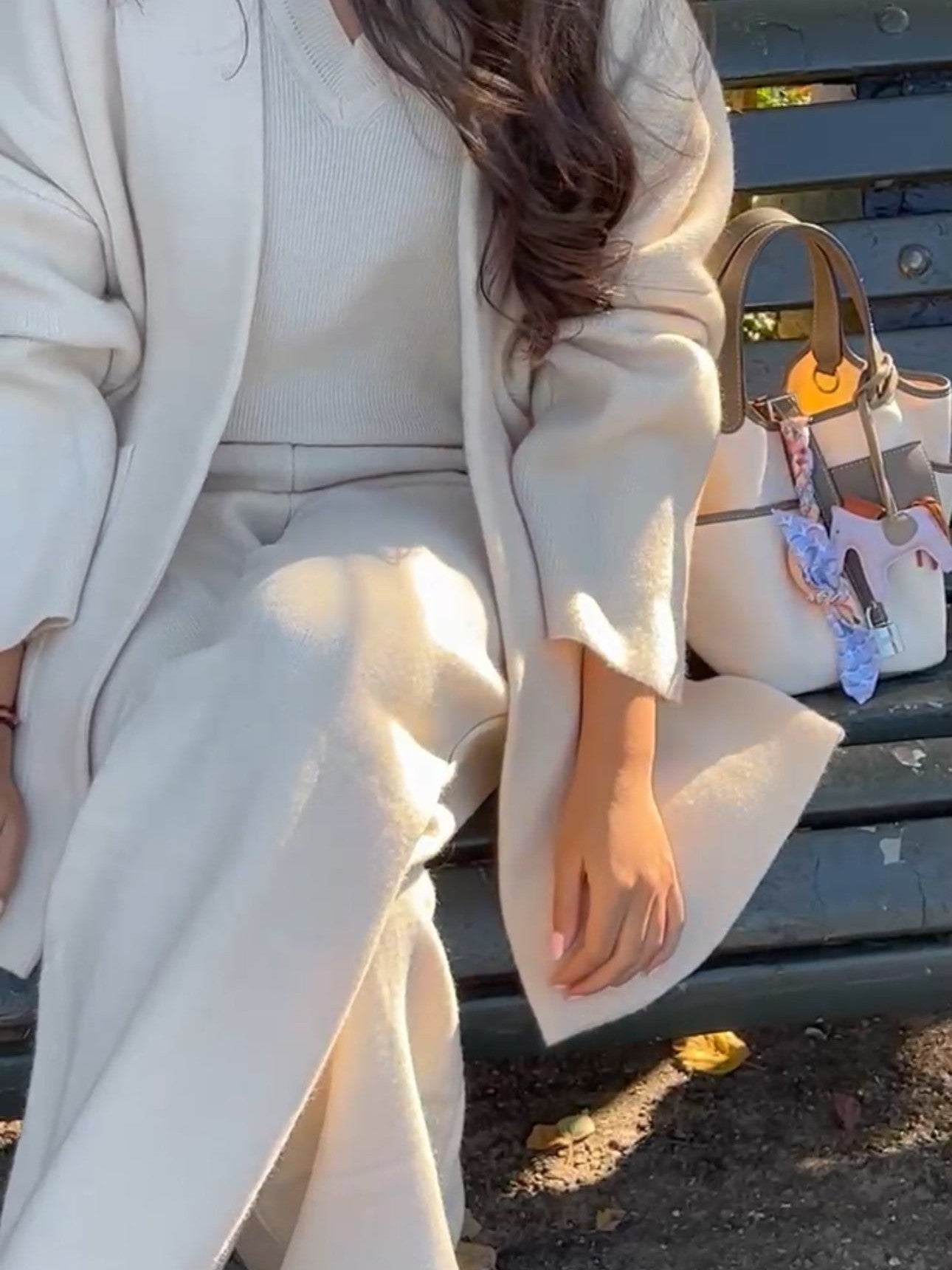 Alaia 3 piece set styled as a casual chic outfit with wide-leg trousers and cardigan