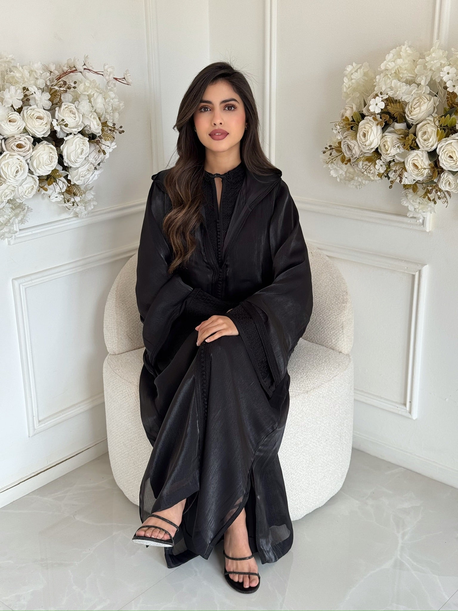 Handmade black jellaba Rokaya with refined detailing and embroidery