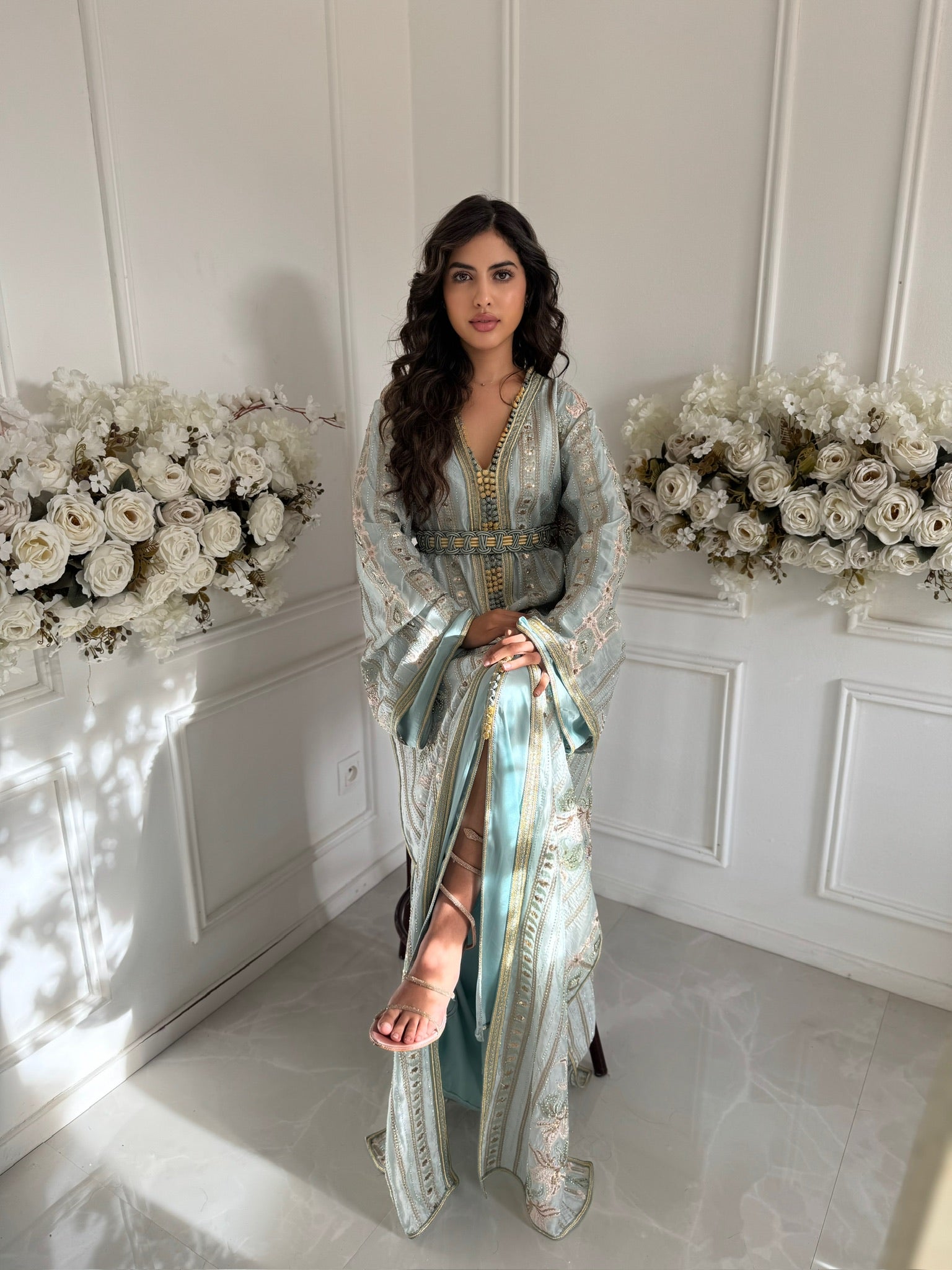 Model wearing handmade Moroccan caftan wedding dress with embroidery