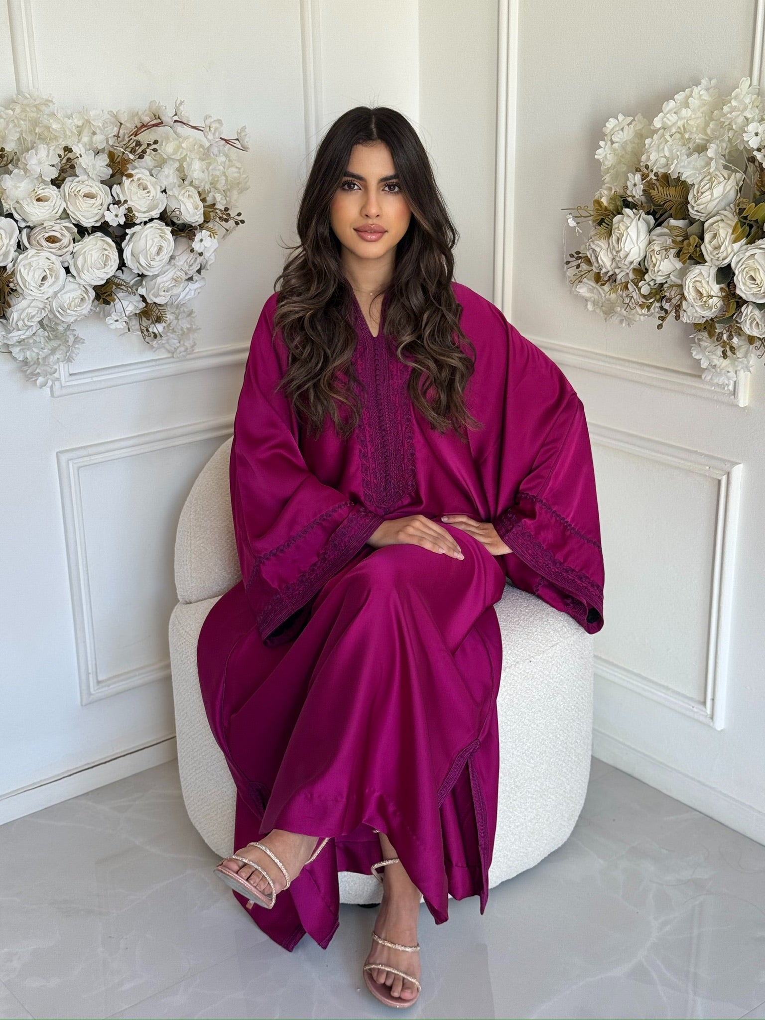 Full-length view of deep rose-pink Moroccan gandoura with elegant details