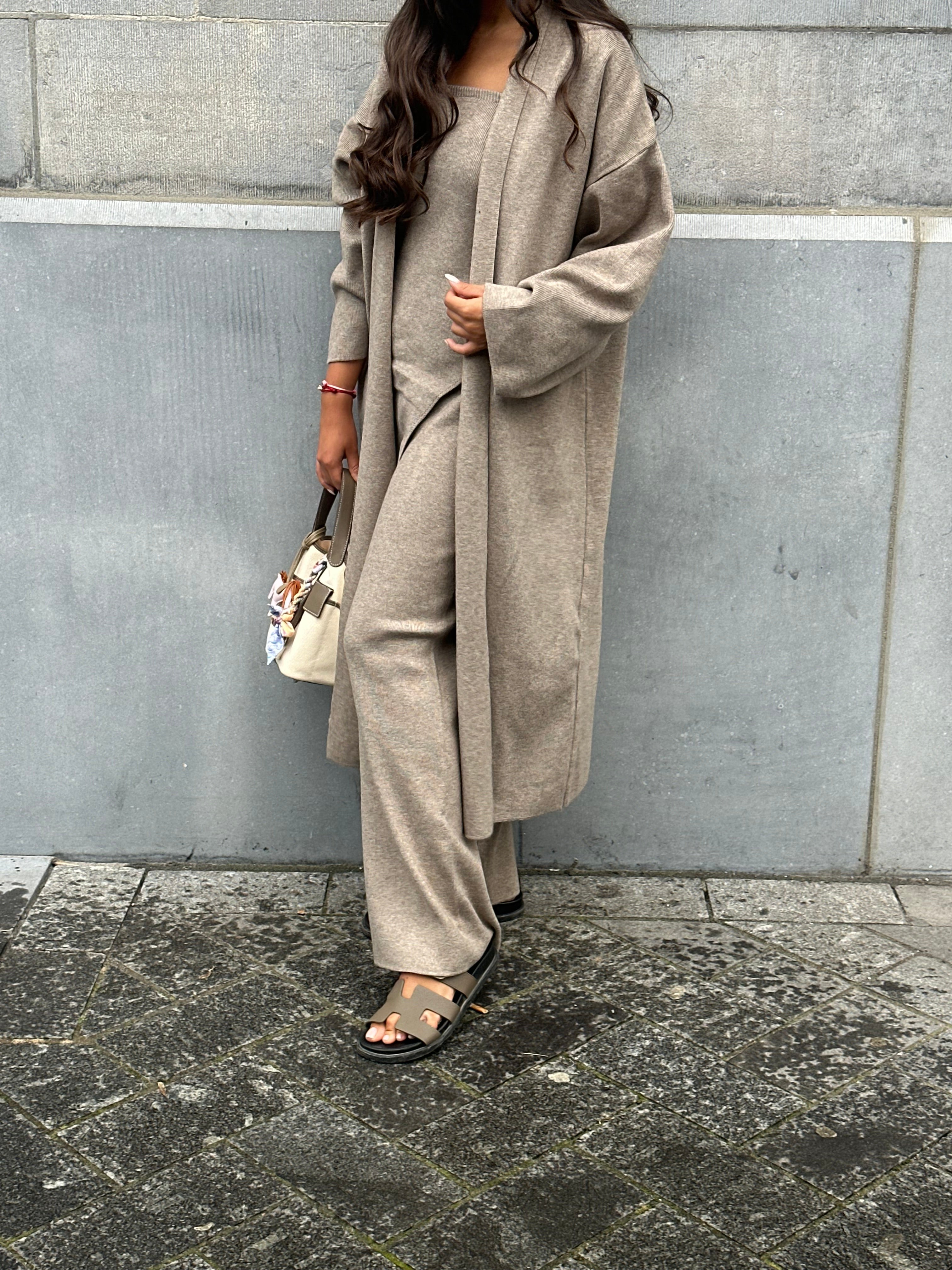 Elegant modern women’s outfit with flowing silhouette