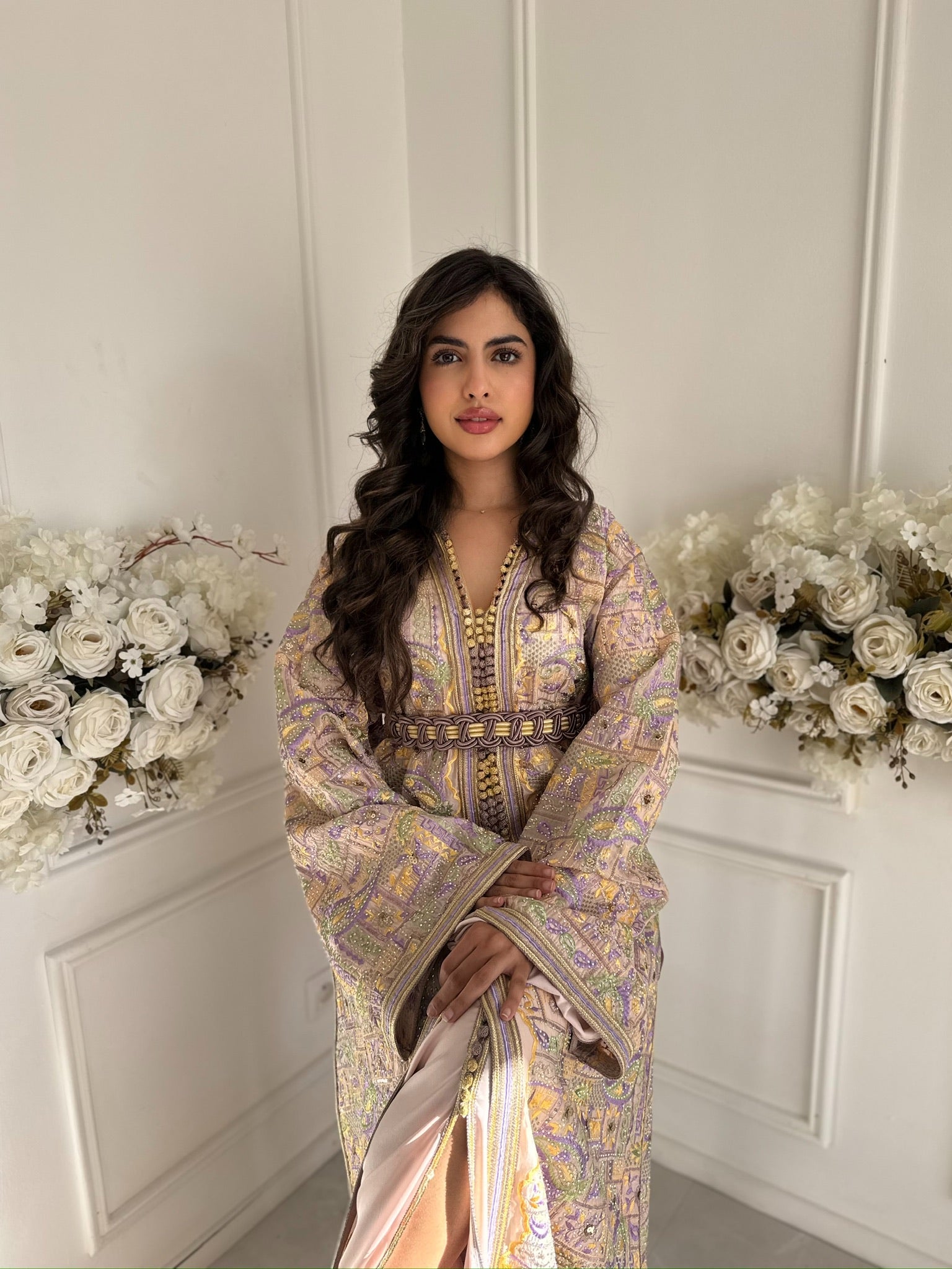 Model wearing Takchita Lilah – embroidered organza Moroccan takchita in pastel tones