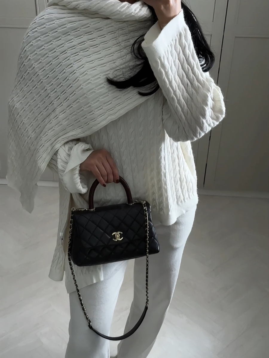 Close-up of Mila wool sweater texture and scarf detail